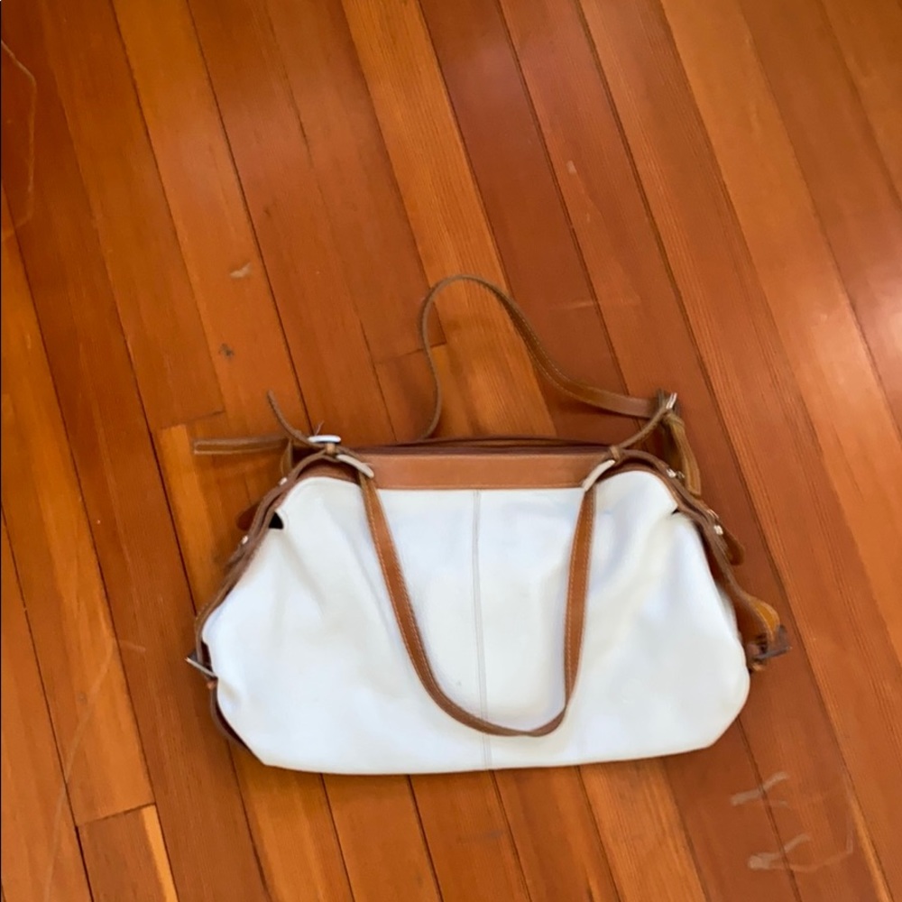 White bag with brown straps